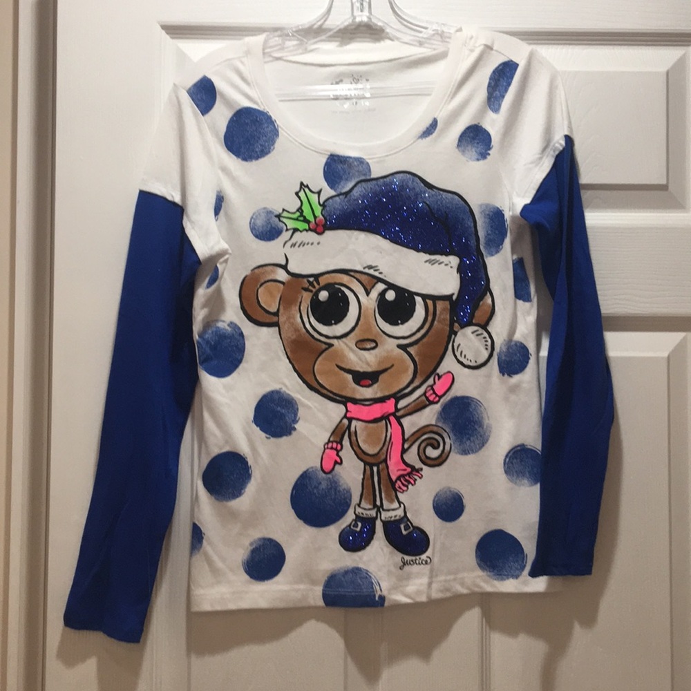 Never worn long sleeve Justice girls tee.  Size 14